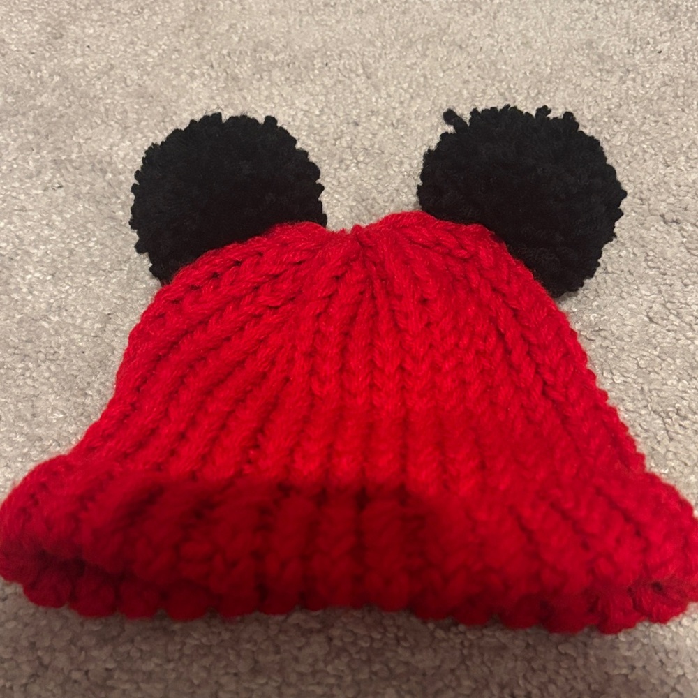 Cozy Red Knit Hat with Black Pom Poms